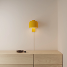 The sunrise Gio Wall Light from Gantri in a primary bedroom.