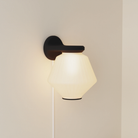 The carbon Granada Wall Light from Gantri.