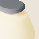 The fog Granada Wall Light from Gantri close up.