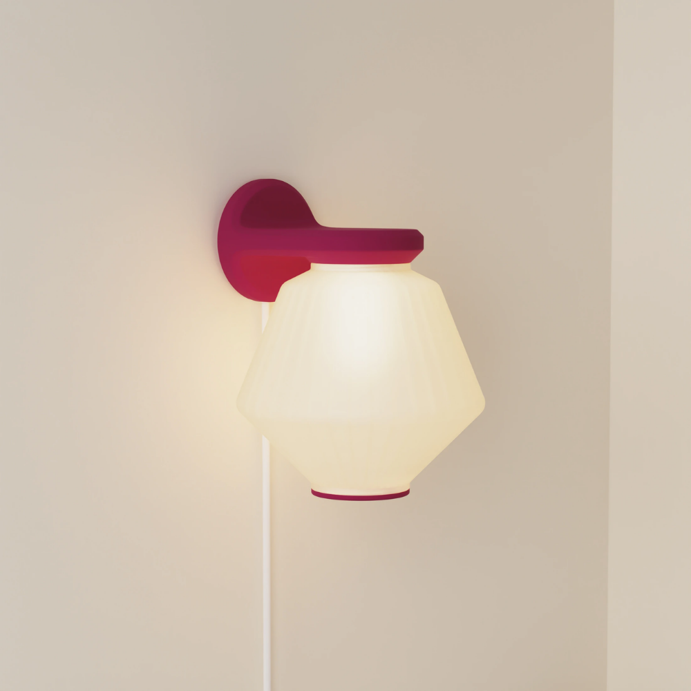 The hibiscus Granada Wall Light from Gantri.