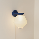 The midnight Granada Wall Light from Gantri.