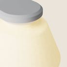 The mist Granada Wall Light from Gantri close up.