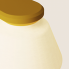 The mustard Granada Wall Light from Gantri close up.