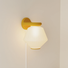 The mustard Granada Wall Light from Gantri.