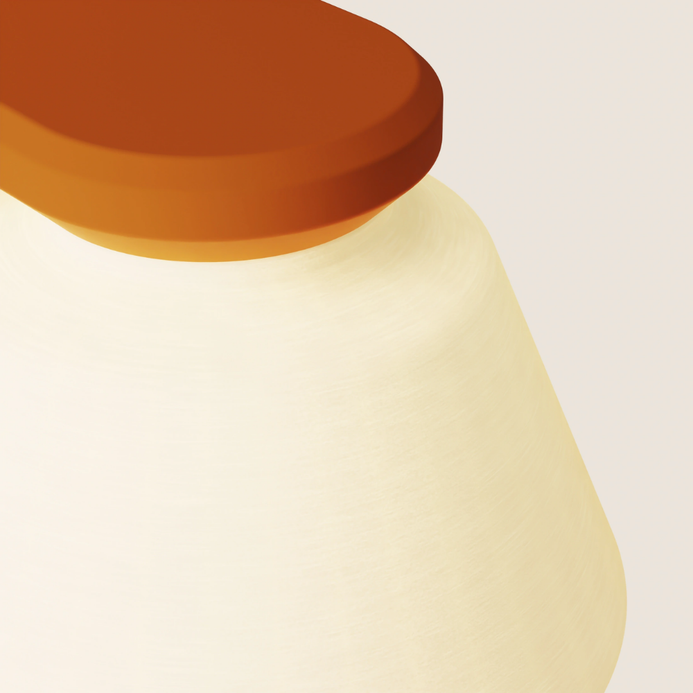 The persimmon Granada Wall Light from Gantri close up.