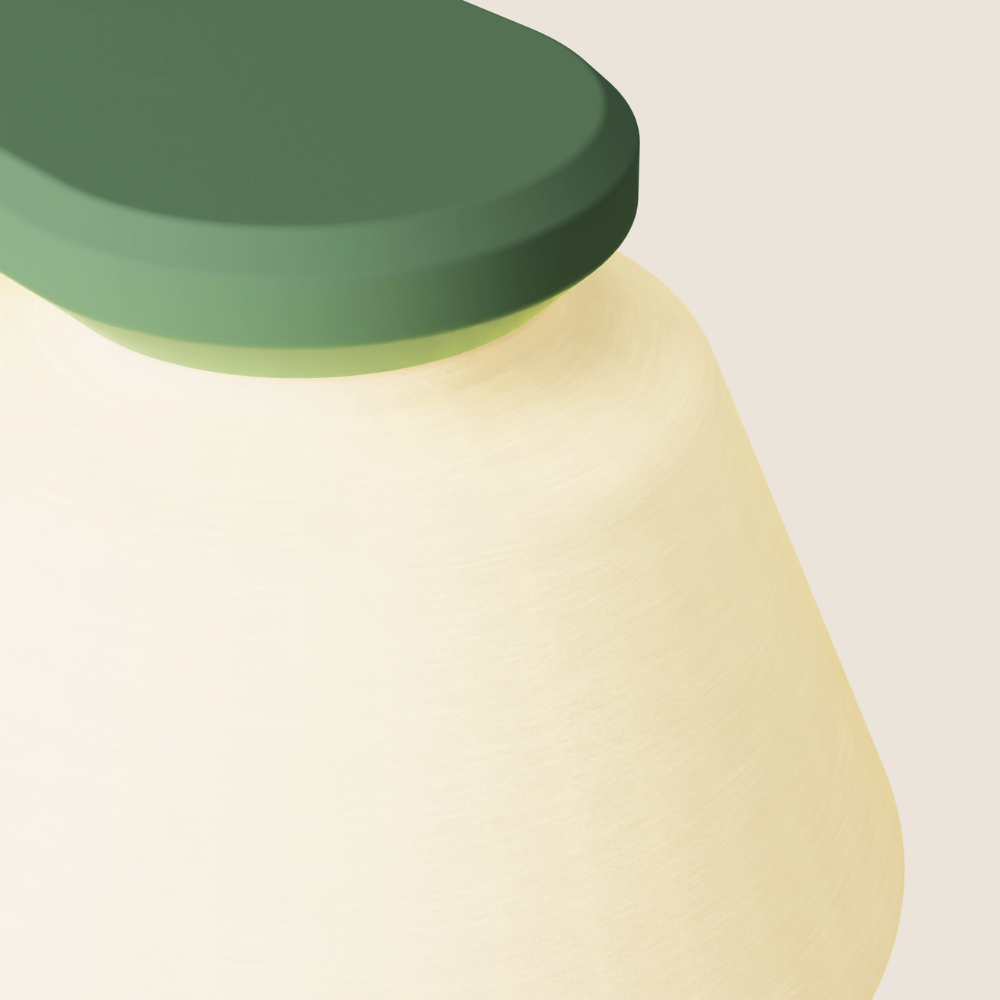 The sage Granada Wall Light from Gantri close up.