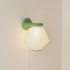 The sage Granada Wall Light from Gantri.