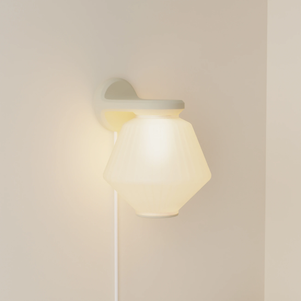 The sand Granada Wall Light from Gantri.