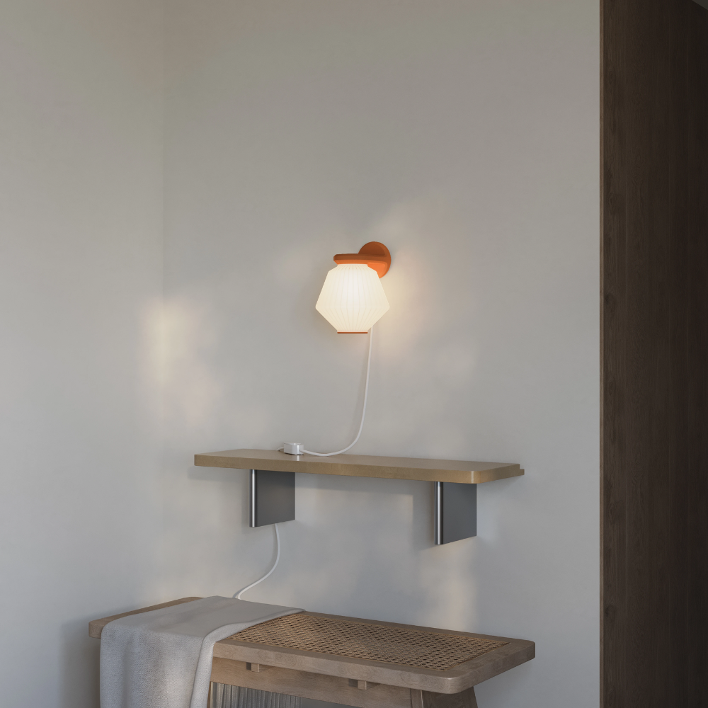 The sedona Granada Wall Light from Gantri in a living room.