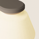 The smoke Granada Wall Light from Gantri close up.