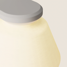The stone Granada Wall Light from Gantri close up.