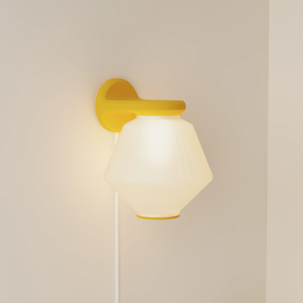 The sunrise Granada Wall Light from Gantri.