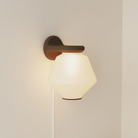 The walnut Granada Wall Light from Gantri.