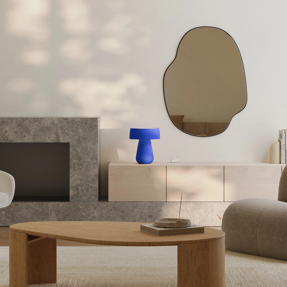 The cobalt Hula Table Light from Gantri in a living room.