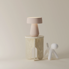 The coral Hula Table Light from Gantri in a living room.