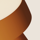 The persimmon Hula Table Light from Gantri close up.