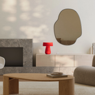 The poppy Hula Table Light from Gantri in a living room. 