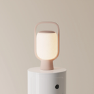 The coral Kero Table Light from Gantri.