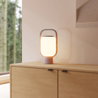 The fog Kero Table Light from Gantri in a living room.