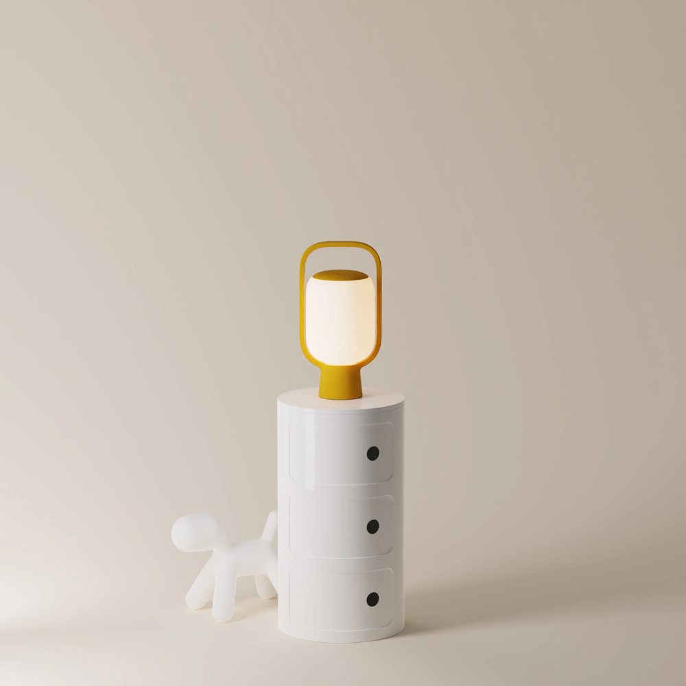 The mustard Kero Table Light from Gantri in a home office.