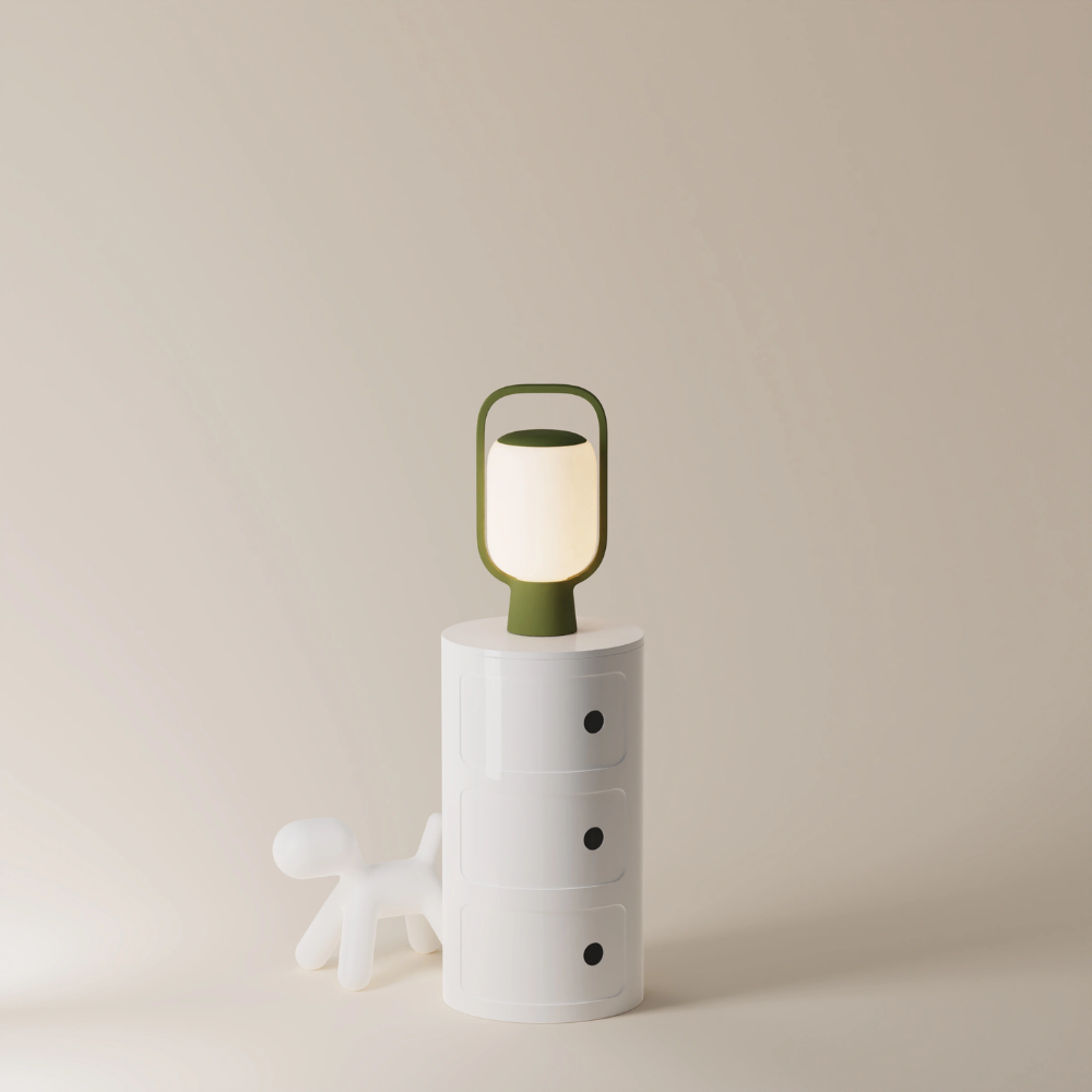 The olive Kero Table Light from Gantri in a home office.