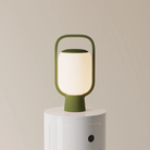 The olive Kero Table Light from Gantri.