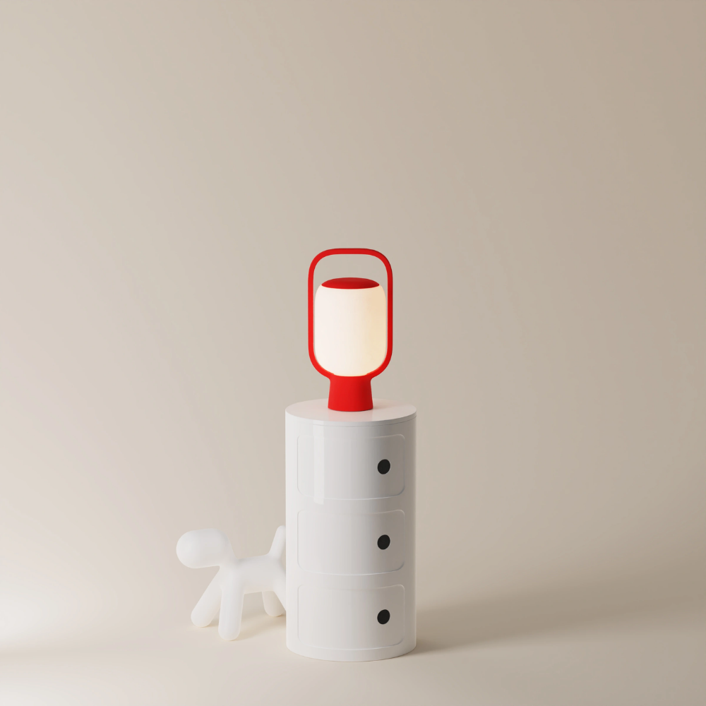 The poppy Kero Table Light from Gantri in a home office.