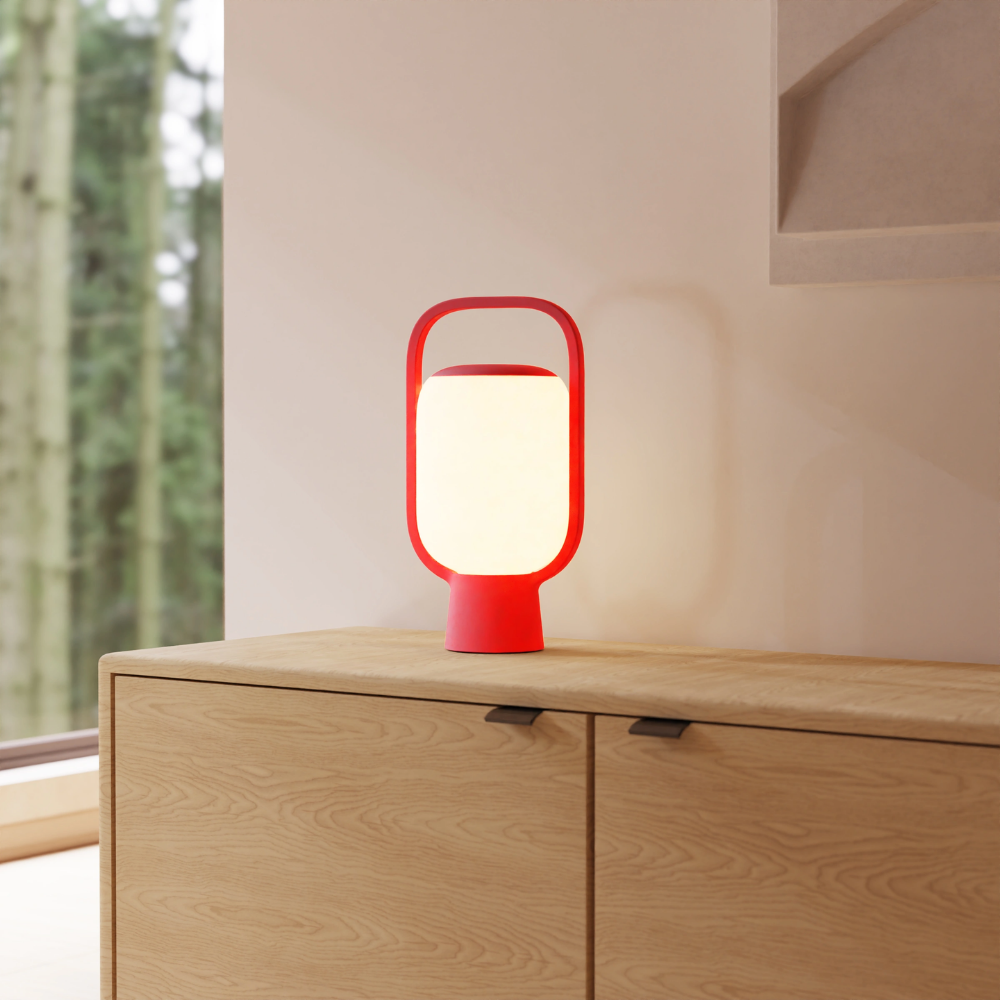 The poppy Kero Table Light from Gantri in a living room.