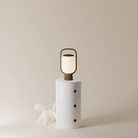 The walnut Kero Table Light from Gantri in a home office.