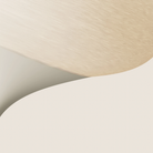 The sand Kobble Floor Light from Gantri close up.