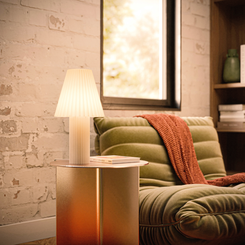 The Pleat Table Light from Gantri in a family area.