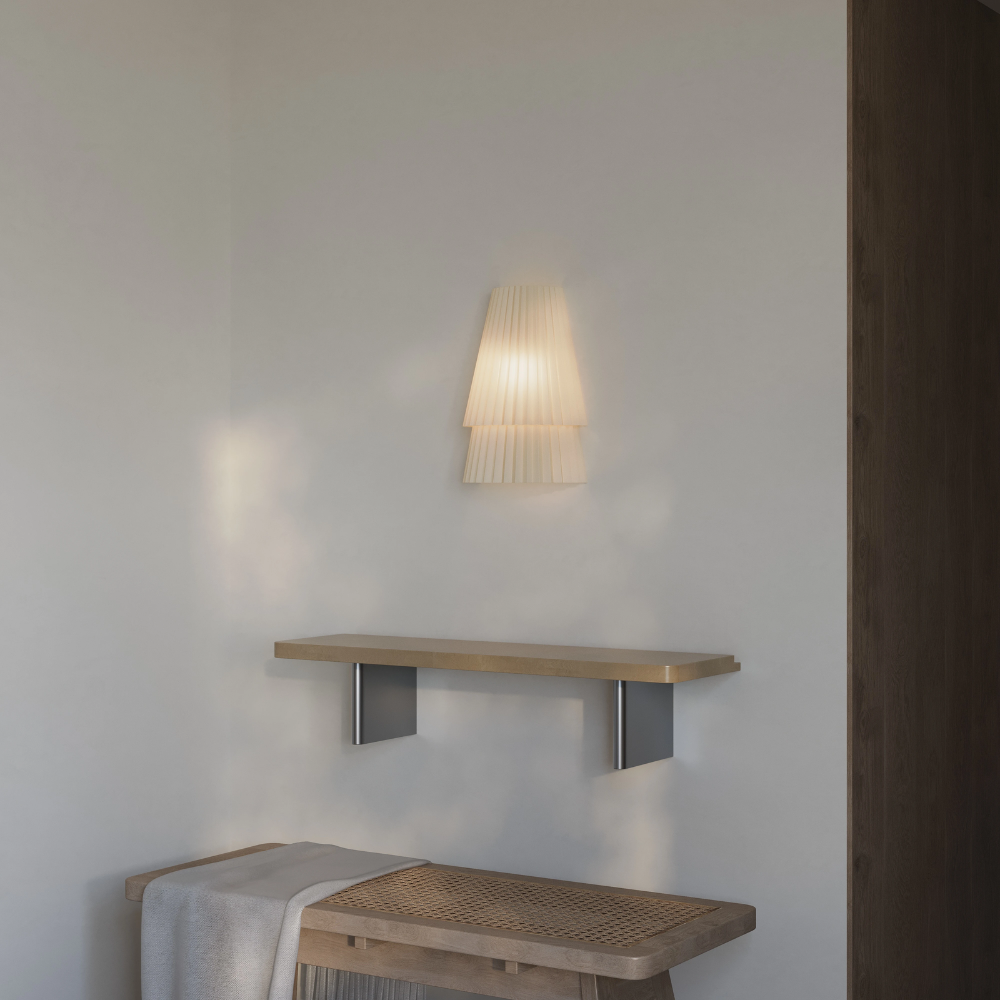 The Pleat Wall Sconce from Gantri in a family area.