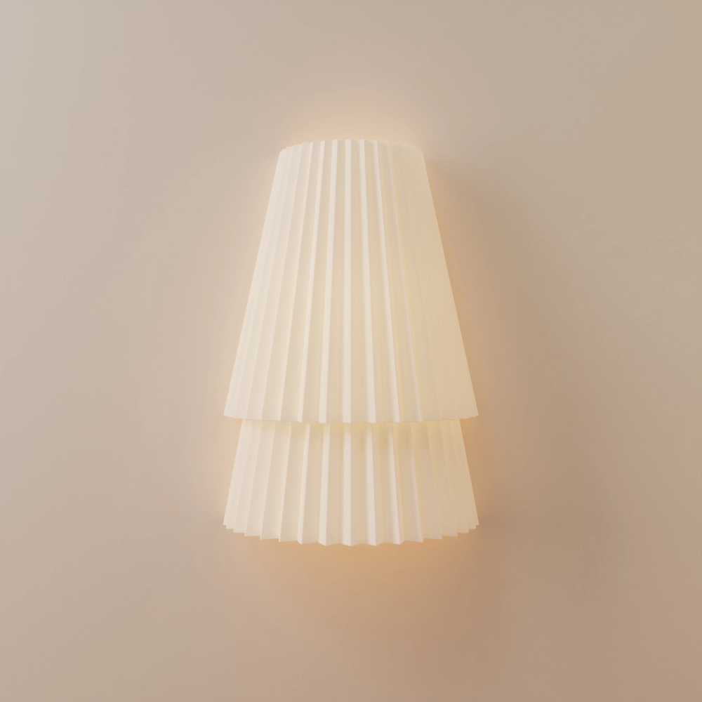 The Pleat Wall Sconce from Gantri in a studio.