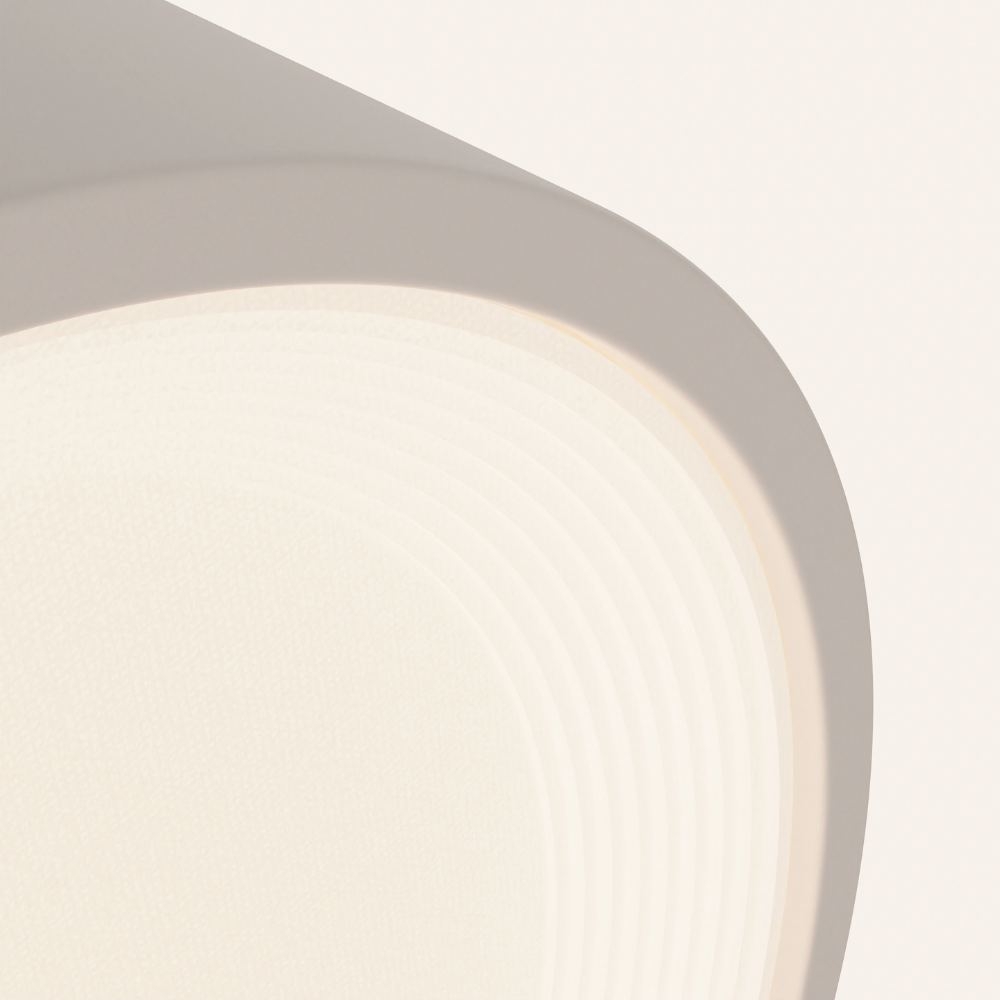 The stone Vitria Flush Mount from Gantri close up.