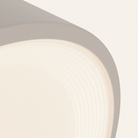 The stone Vitria Flush Mount from Gantri close up.