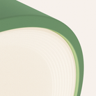 The sage Vitria Flush Mount from Gantri close up.