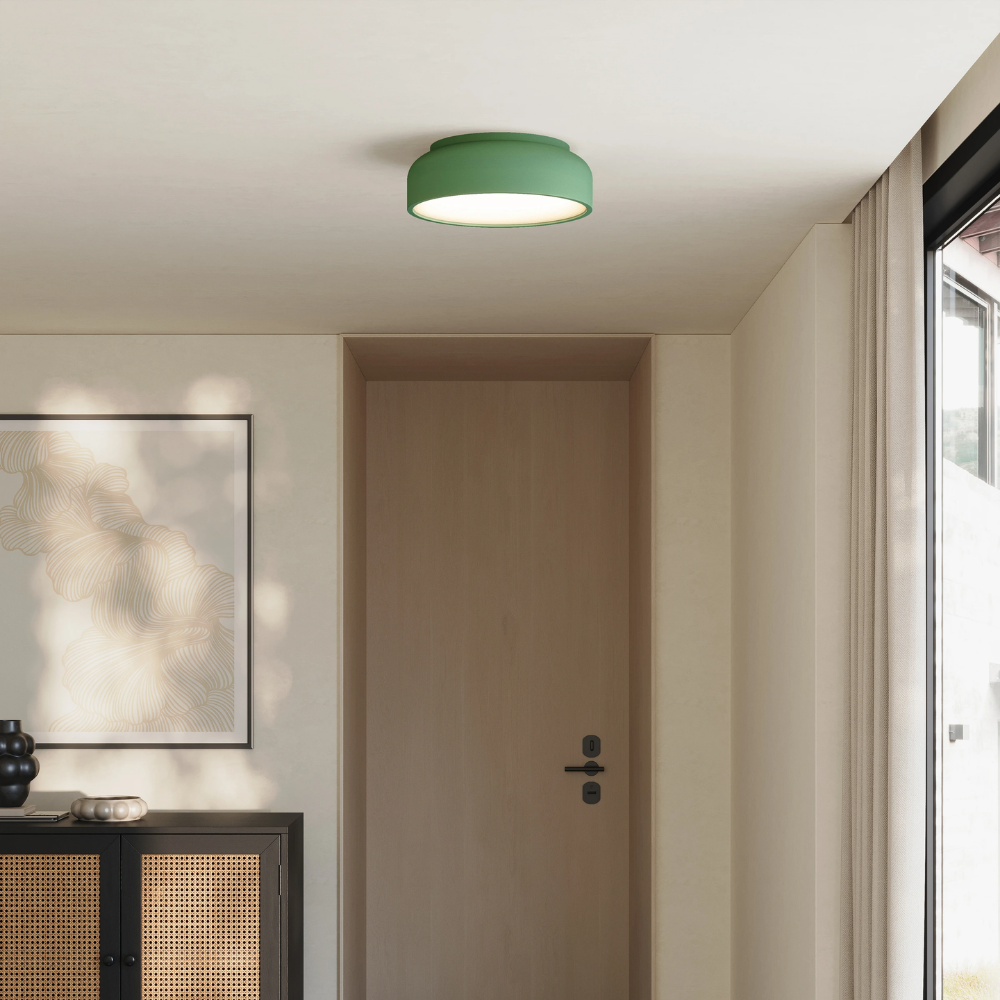 The sage Vitria Flush Mount from Gantri in a living room on the ceiling.
