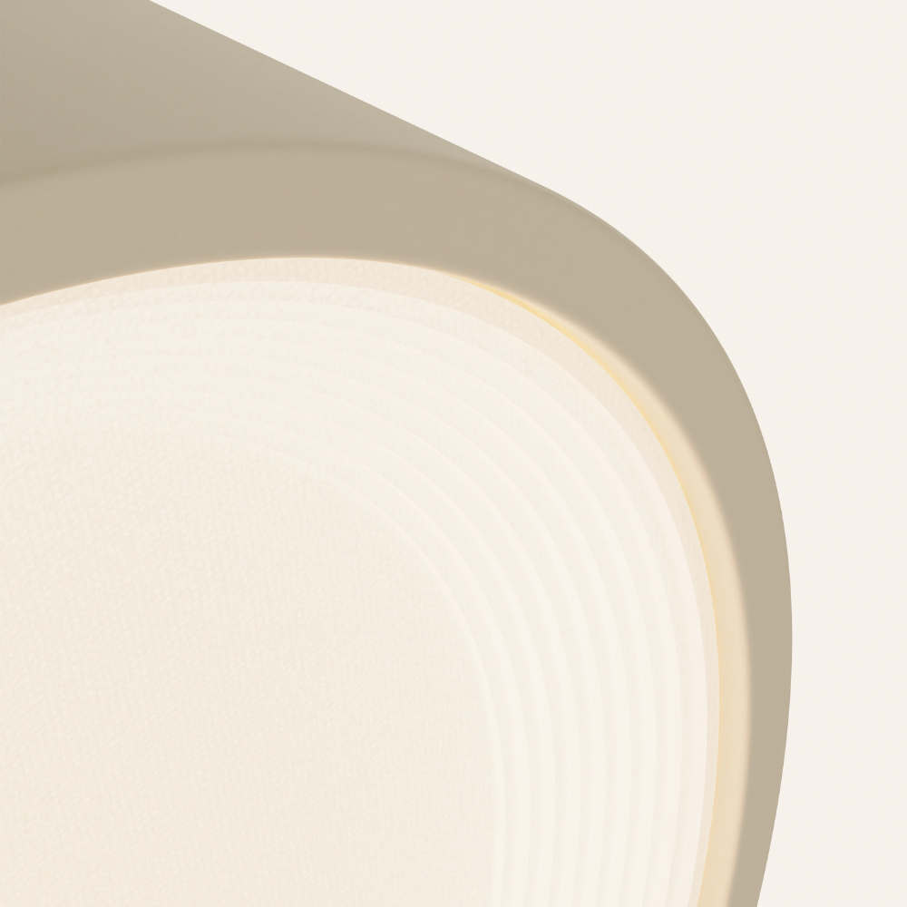 The sand Vitria Flush Mount from Gantri close up.