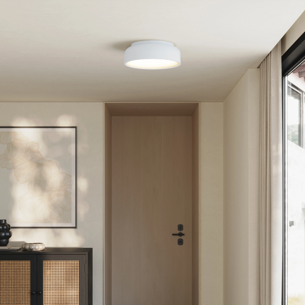 The snow Vitria Flush Mount from Gantri in a living room on the ceiling.