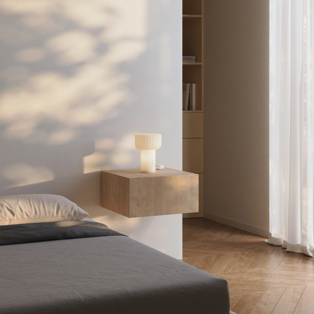 The Word Table Light from Gantri in a guest bedroom.