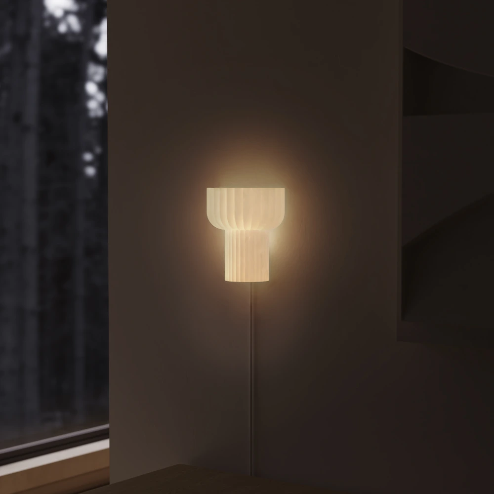 The white Word Wall Light from Gantri in a dark family space, lighting up the room.