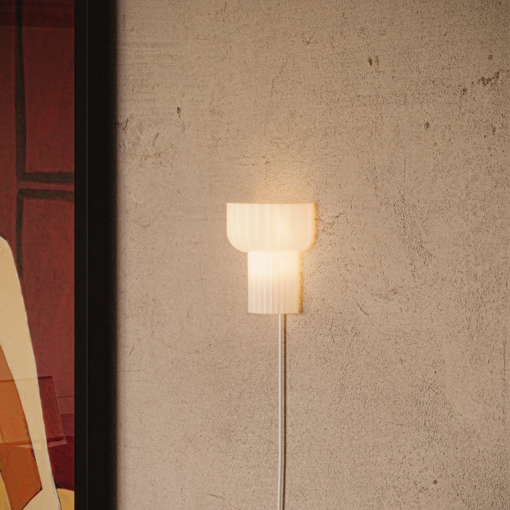 The white Word Wall Light from Gantri in a living space.