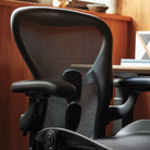 The Aeron Chair from Herman Miller in a photograph highlighting the elastomeric suspension seat.