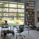 The Aeron Chair from Herman Miller in a garage converted into a work space.