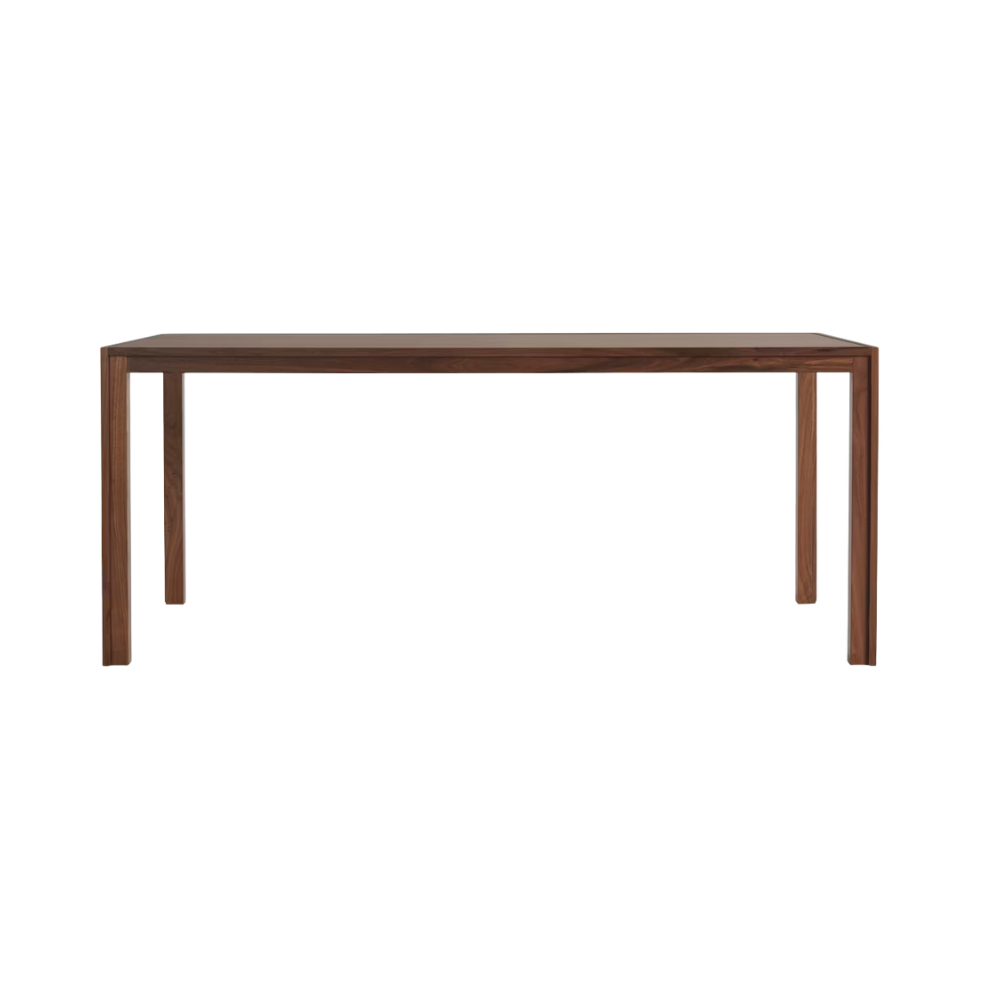 The walnut 70 x 36 inch Doubleframe Table from Herman Miller.