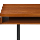 The walnut Eames 2500 Series Executive Desk from Herman Miller showing the storage cubby.