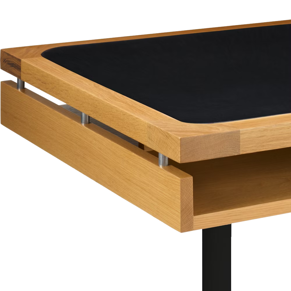 The white oak Eames 2500 Series Executive Desk from Herman Miller with the leather inlay finish close up.