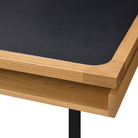 The white oak Eames 2500 Series Executive Desk from Herman Miller with the leather inlay finish in detail.