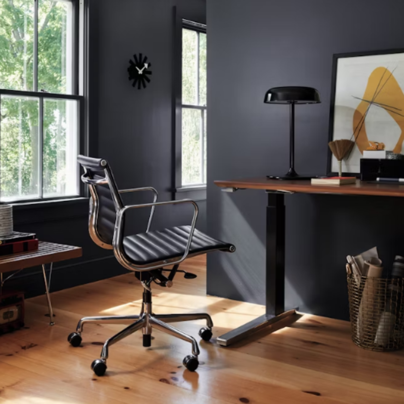 The Eames Aluminum Group Chair, Executive from Herman Miller in a residential setting.