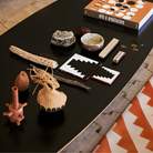 The black Eames Elliptical Table from Herman Miller in a home office. all-groups